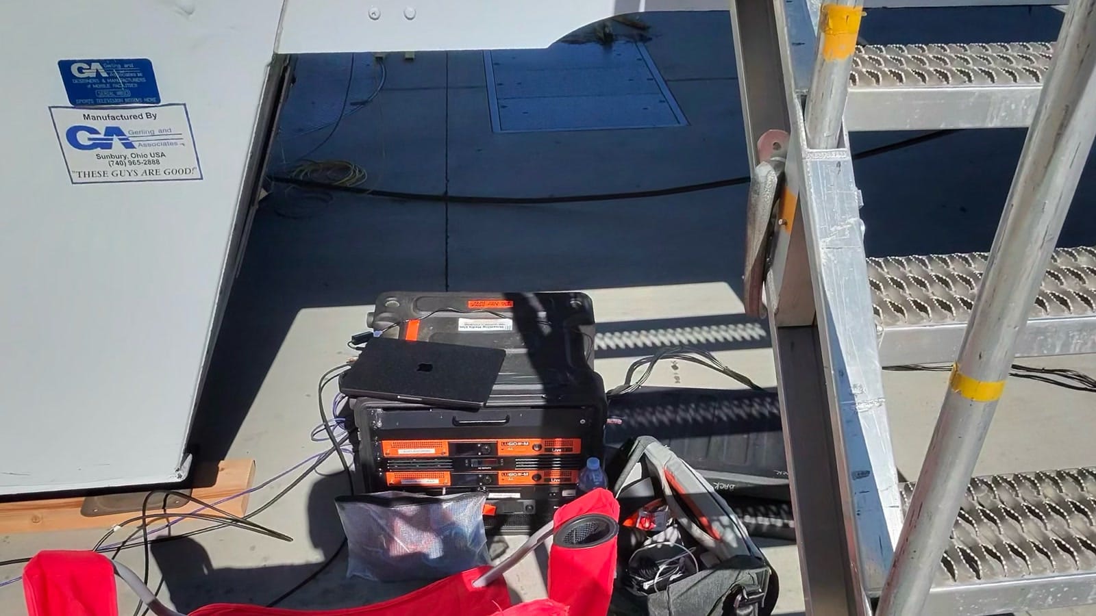 Portable LiveU transmission equipment staged beside a production truck