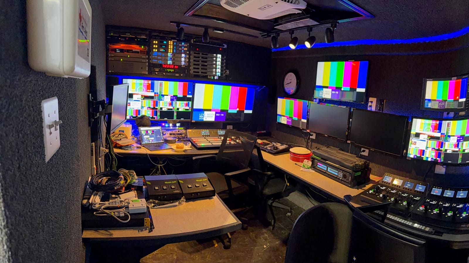 Temporary production control room with multiview monitors and routing equipment during Rose Parade rehearsal