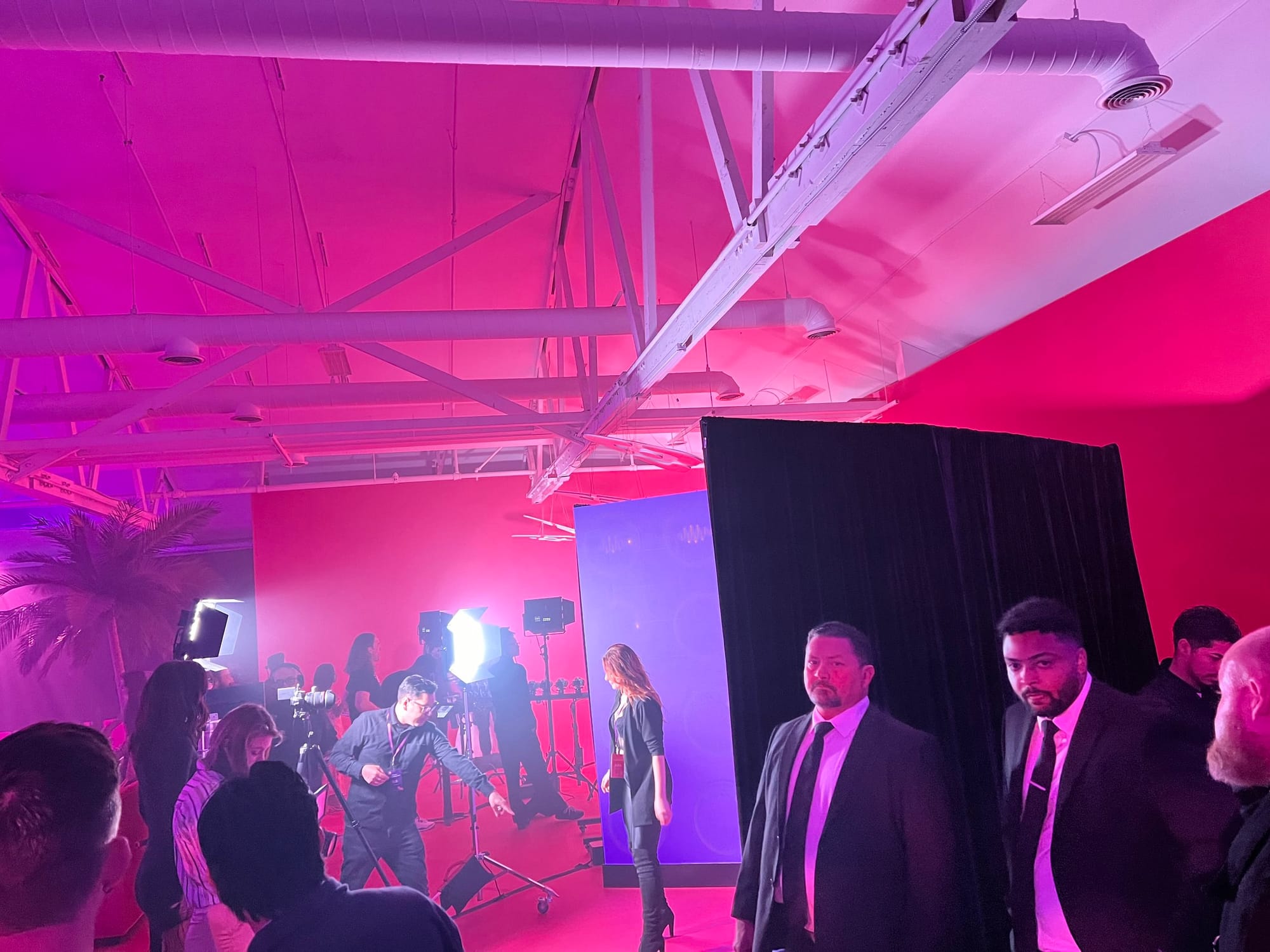 Indoor Vinivia Awards staging with guests, crew, and lighting equipment