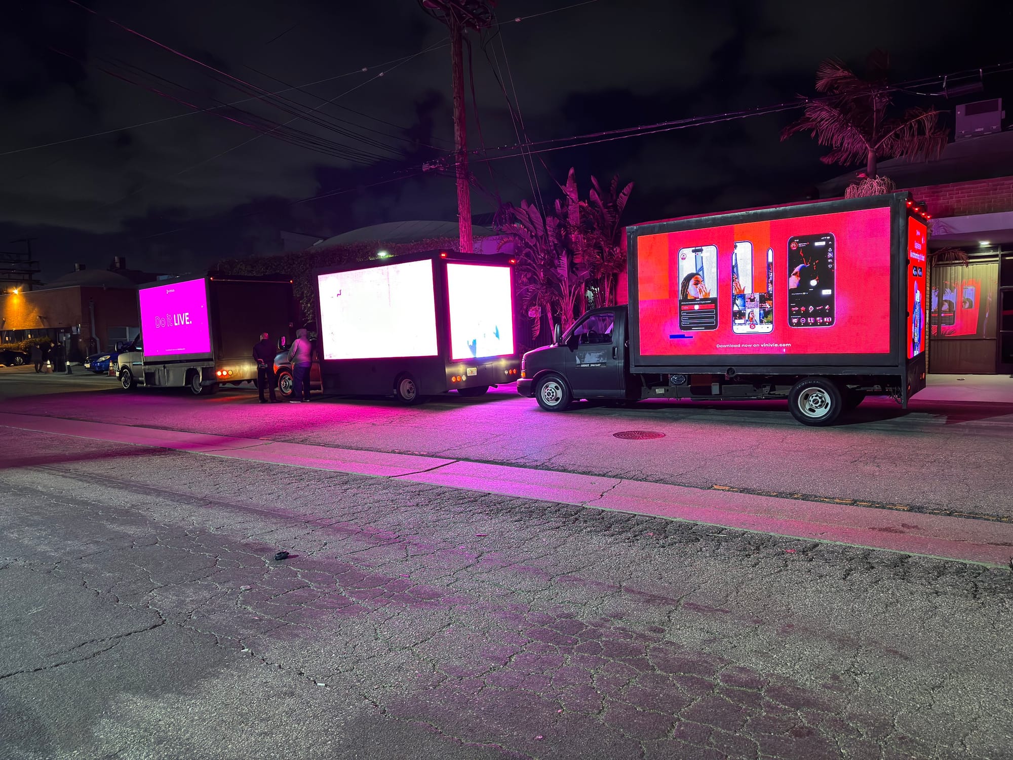 Vinivia mobile display parked outside the event venue at night