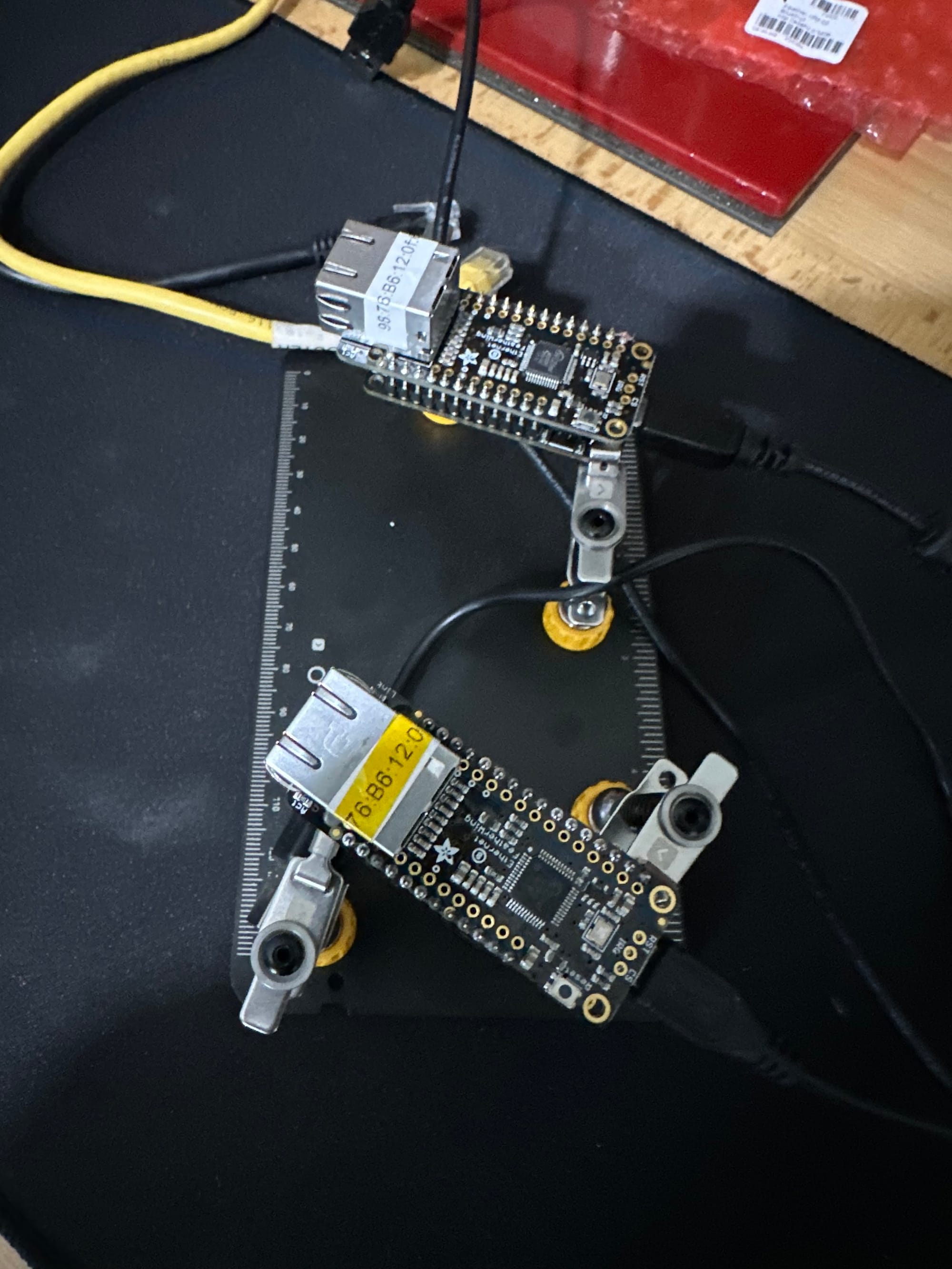 Two compact controller boards connected during the final documented bench configuration
