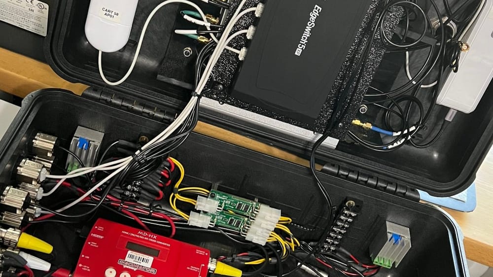 Open SetNet remote-production case containing bonded connectivity and video equipment