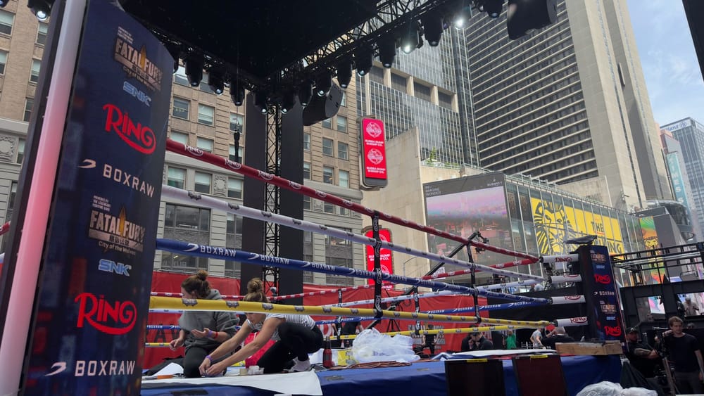 Fatal Fury boxing ring in Times Square while event crews prepare the temporary venue