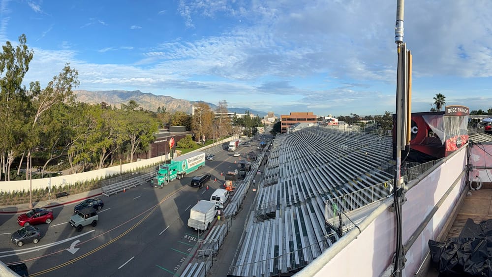 Empty Rose Parade grandstands and production platforms along the Pasadena route before the 2026 event