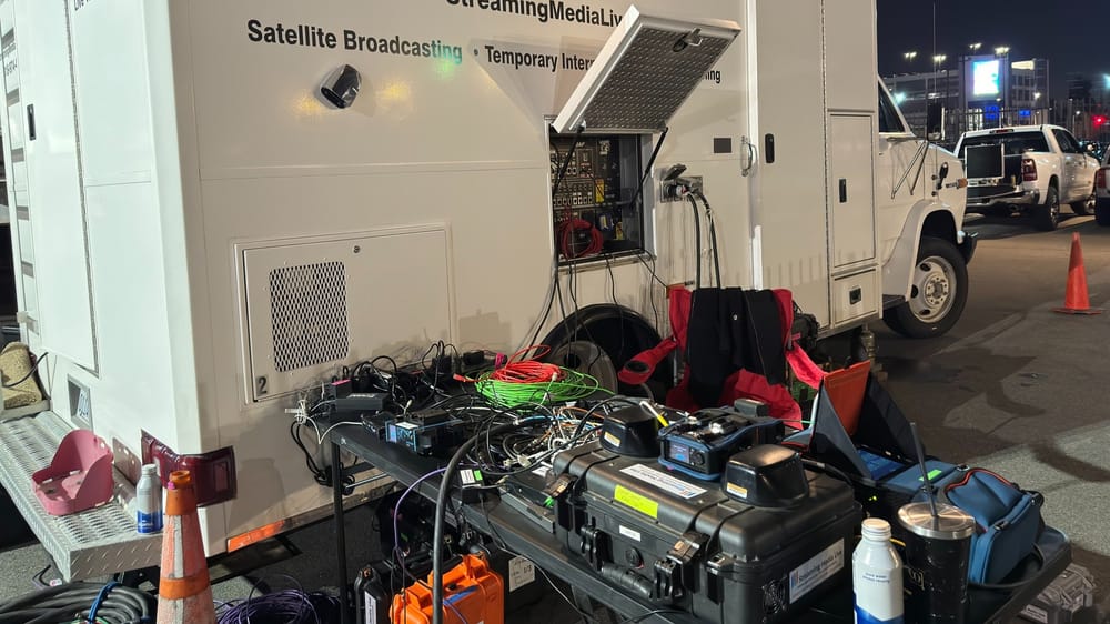 Transmission equipment beside a satellite broadcast truck at the Los Angeles Coliseum
