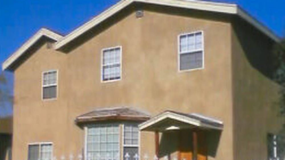 Archival exterior photograph of Thomas Fraley's first home after construction was completed in 2001