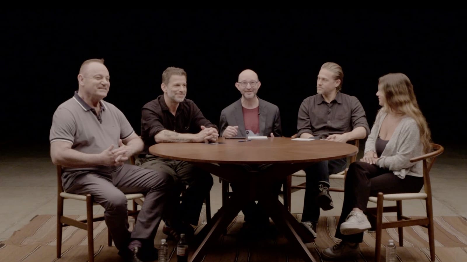 Five panelists seated around a round table during AFSP's A Talk Away the Dark discussion at ArtCenter