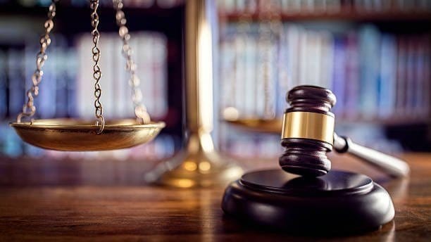Scales of justice and a gavel representing ongoing technology support for Zavala Law Firm